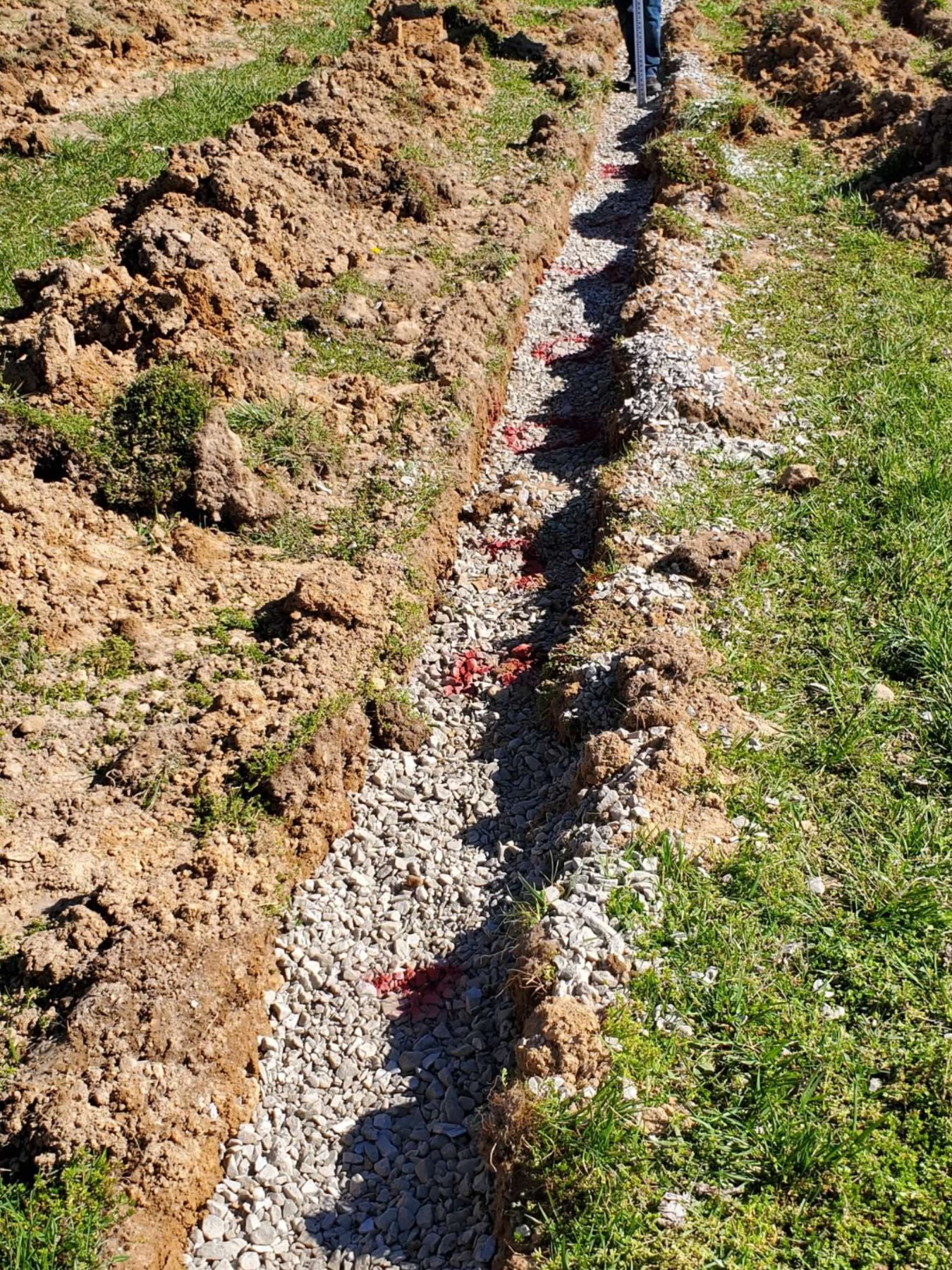 What the Stone in an Open Septic Trench Tells You
